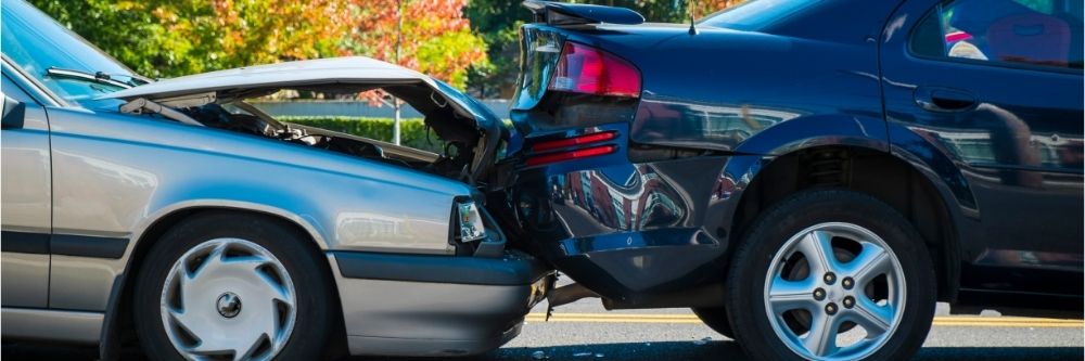 Who is at fault in a car accident when backing up?
